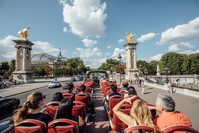 Paris Big Bus Hop-On Hop-Off Tour with Optional River Cruise - Reading the Route From the Louvre to Notre Dame