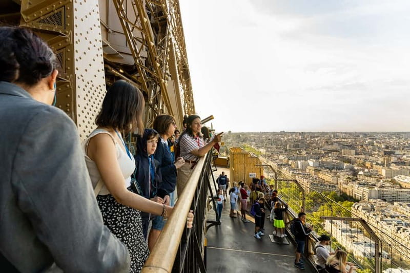 Paris: Eiffel Tower Guided Tour and Seine River Cruise - Riding the elevator to the Eiffel Tower’s second floor