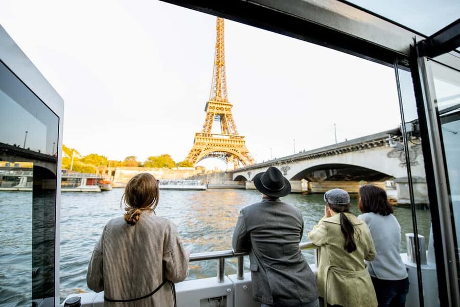 Paris: Eiffel Tower Tour & Seine River Cruise Tour - Learning the story of the Iron Lady