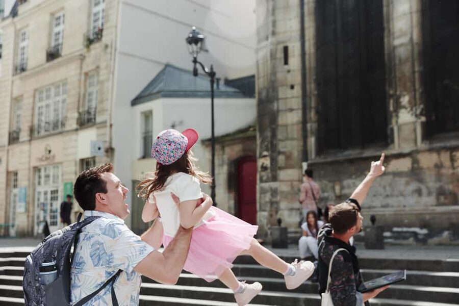 Paris Family Adventure: Quest for Kids & Seine Cruise Pass - Walking along the Seine before the cruise