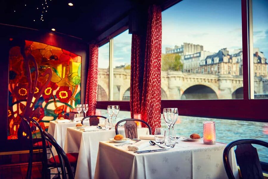 Paris: Seine River Cruise with 3-Course Dinner & Live Music - A small boat with a big Paris view