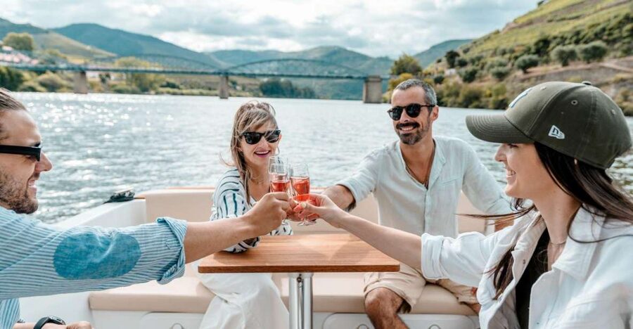 Pinhão: Douro River Solar Boat Tour with Wine Tasting - Booking, languages, and cancellation