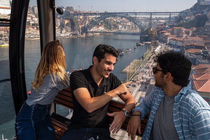 Porto Walking Tour, Lello Bookshop, River Cruise and Cable Car - The Douro cruise under Porto’s bridges
