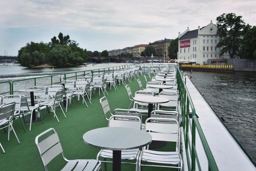 Prague: Lunch Cruise on Vltava River with open Buffet - Prague Castle and the Lesser Town skyline