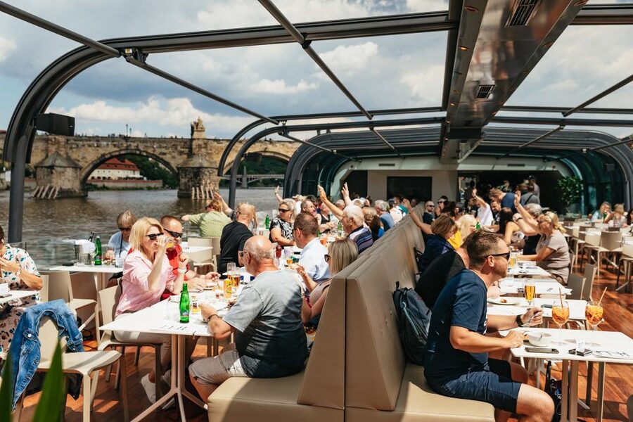 Prague: Vltava River Lunch Cruise in an Open-Top Glass Boat - Lunch begins while Prague keeps moving