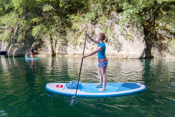Private Half Day Stand-up Paddle Boarding on the Soča River - Crossing Lake Most na Soči toward the canyons