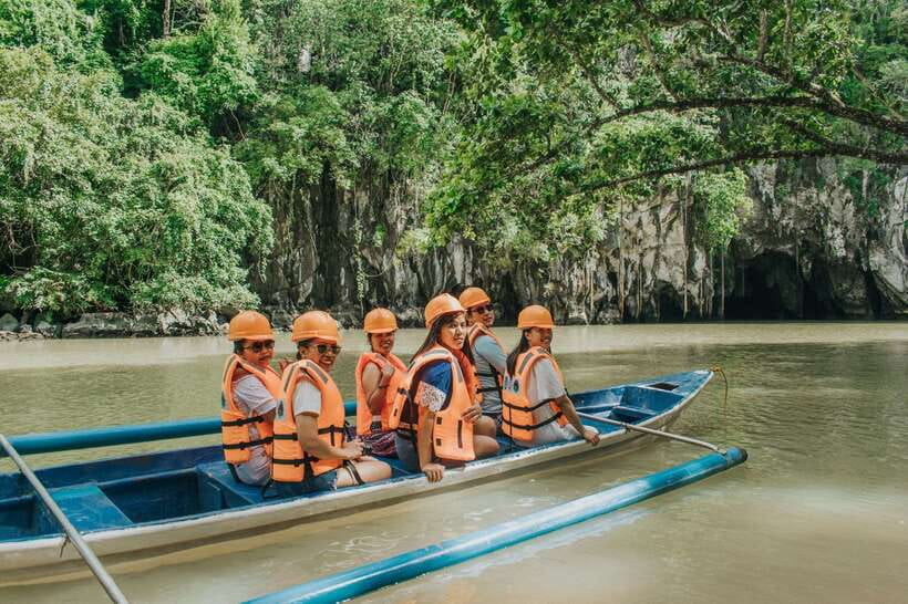 Puerto Princesa: Underground River, Zipline, Paddleboat Tour - Entering the Underground River by motorboat
