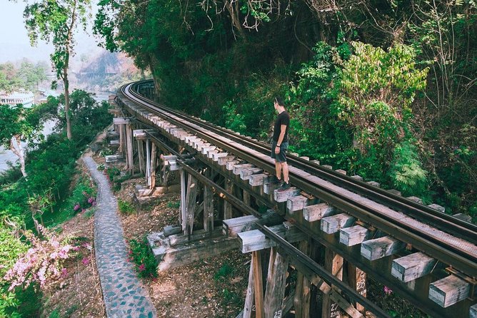 River Kwai Day Tour from Bangkok: History, Scenic Views & Culture - Walking across the River Kwai Bridge