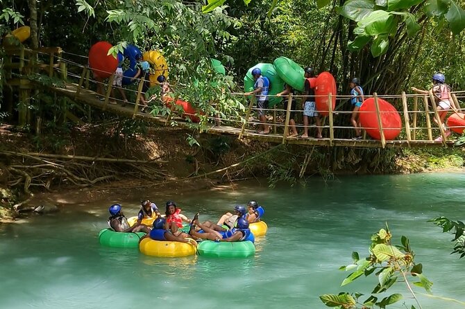 River Rapids Waterfalls Tubing and Beach Adventure with Transport - Rio Bueno tubing starts with jungle, rock, and moving water