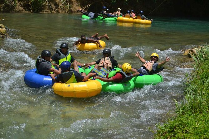 River Rapids Waterfalls Tubing and Beach Adventure with Transport - Calm stretches and moderate rapids on the main ride