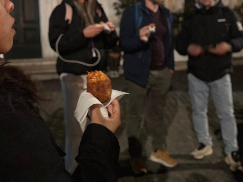 Rome: Trastevere & Tiber Island Street Food Tour at Sunset - Crossing into Trastevere’s old lanes