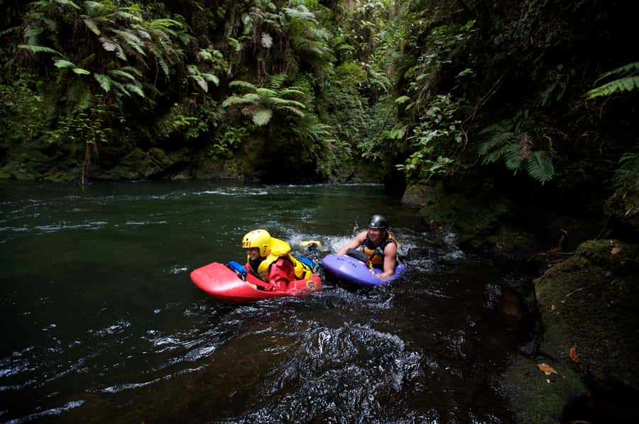 Rotorua Sledging: Kaituna White Water River Board Experience - Getting into the Kaituna River near Rotorua