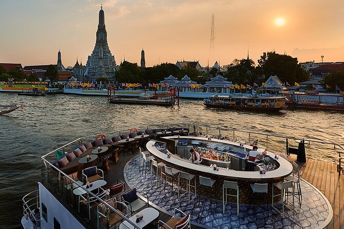 Saffron: A Luxurious Dinner Voyage on the River of Kings - The Grand Palace and Wat Arun after sunset