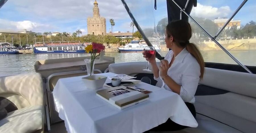 Seville: Exclusive River Boat Tour with Tapas - First views: La Cartuja and the 1992 Expo area