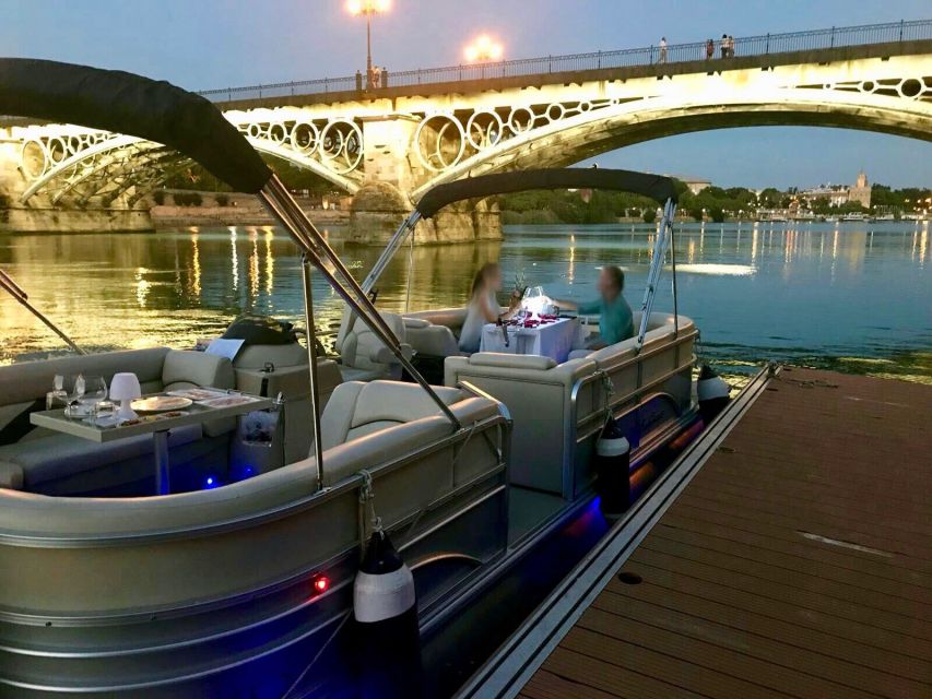 Seville: Exclusive River Boat Tour with Tapas - Passing beneath Triana Bridge into the old city
