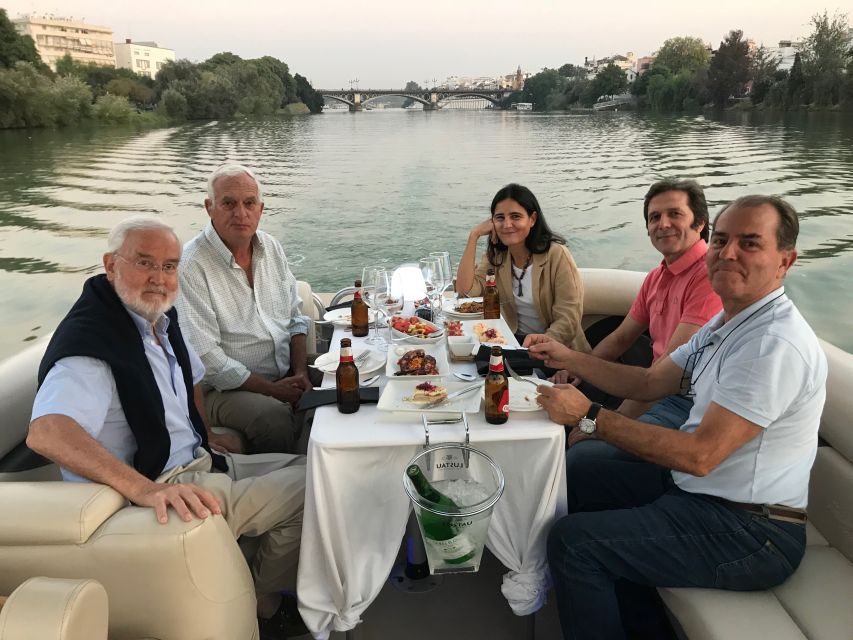 Seville: Exclusive River Boat Tour with Tapas - The 1929 exhibition buildings and Plaza de España