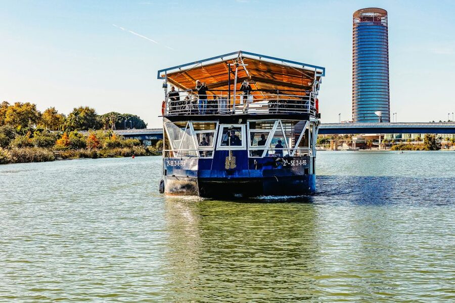 Seville: Guadalquivir River Cruise - Passing beneath Puente de Triana