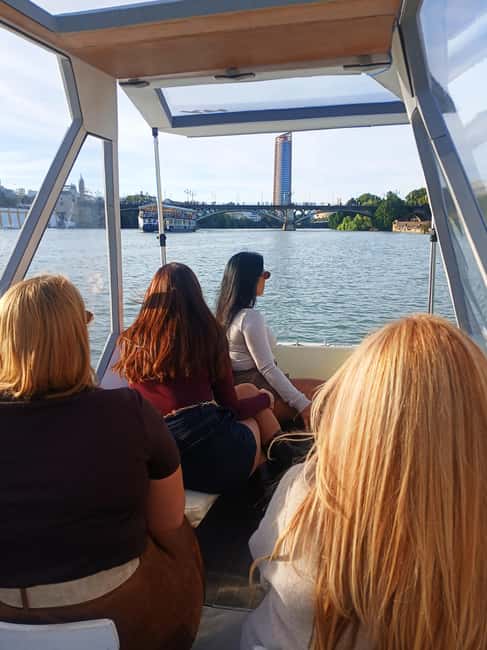 Seville: Sail the River. 100% private - Triana Bridge and the old port from the water