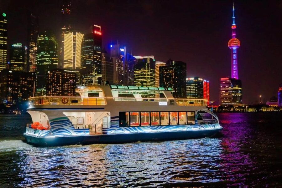 Shanghai: Night River Cruise Tour with Xinjiang Style Dining - The Bund and Pudong tell two different stories