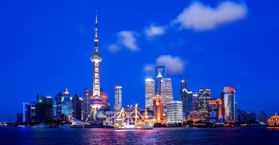 Shanghai: Night River Cruise Tour with Xinjiang Style Dining - At the cruise terminal and on the water