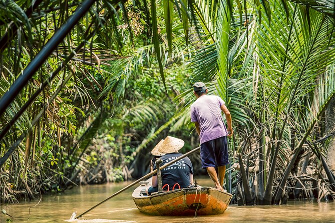Small-Group Mekong Delta Day Trip: Boat Ride, Cottages & Pagoda - Cruising past Rach Mieu Bridge
