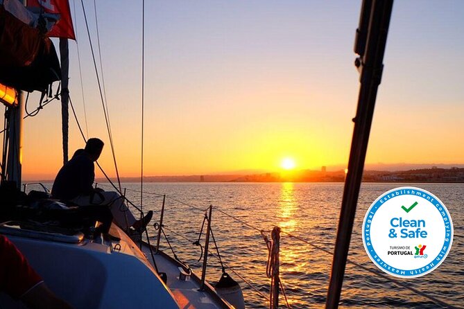 Sunset Sailing Tour On The Tagus River - Leaving Belém with a drink in hand