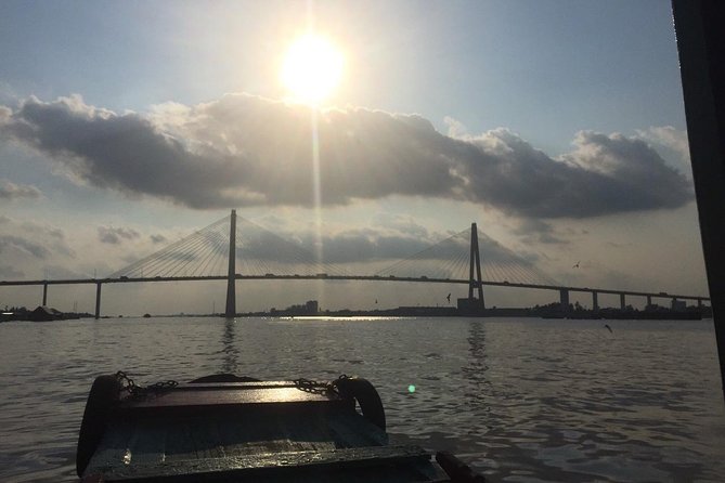 VIP Tour Cuchi Tunnels & Mekong Delta Cruise Full Day Group 12pax - Ben Luc barbecue lunch and a local cooking lesson